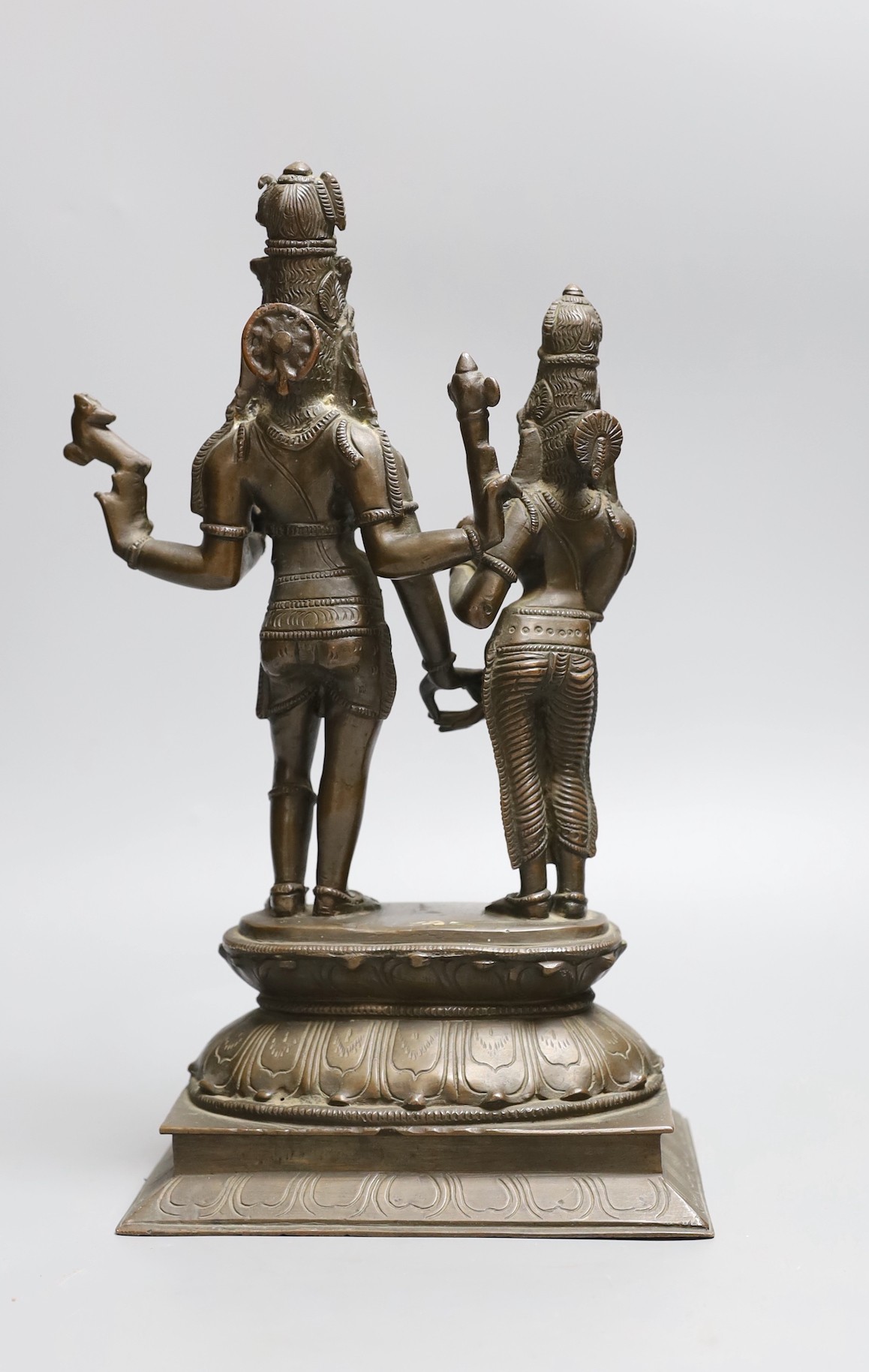 An Indian bronze group Shiva and Pavarti, early 20th century, 33cms high